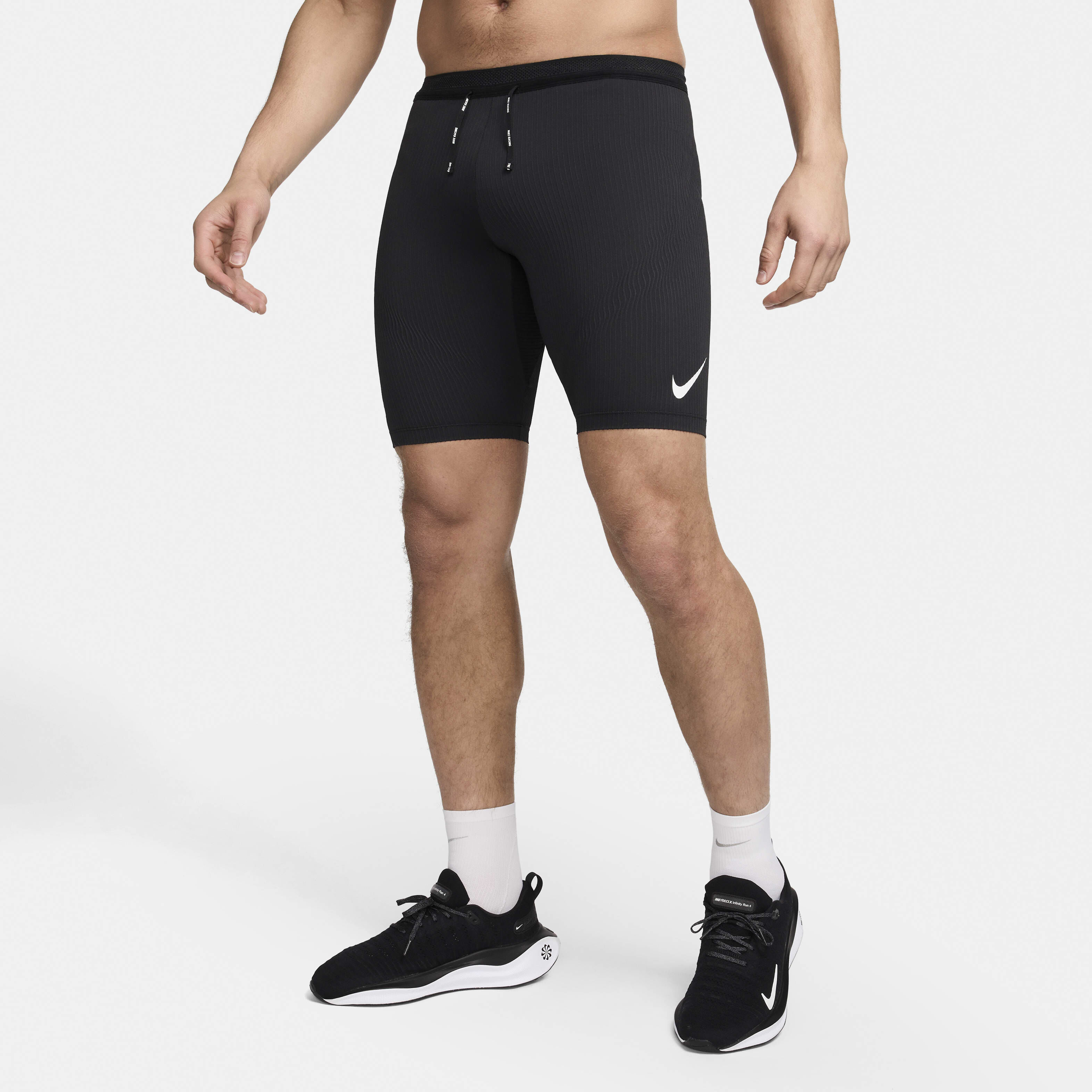 Buy Nike AeroSwift Men s Dri FIT ADV Running 1 2 Length Leggings Nike Qatar Official