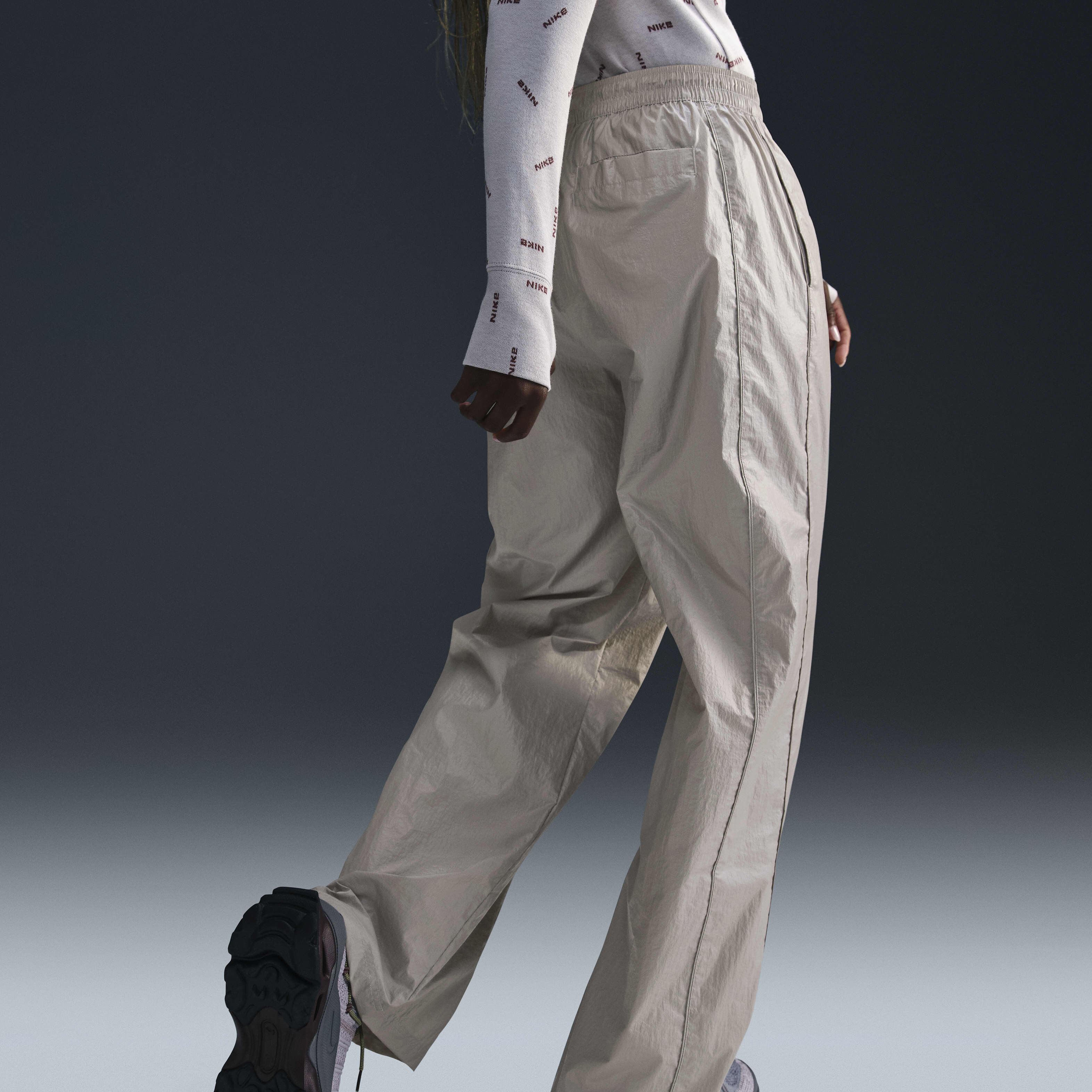 Buy Nike Windrunner Women s Woven High Waisted Open Hem Trousers Nike Qatar Official