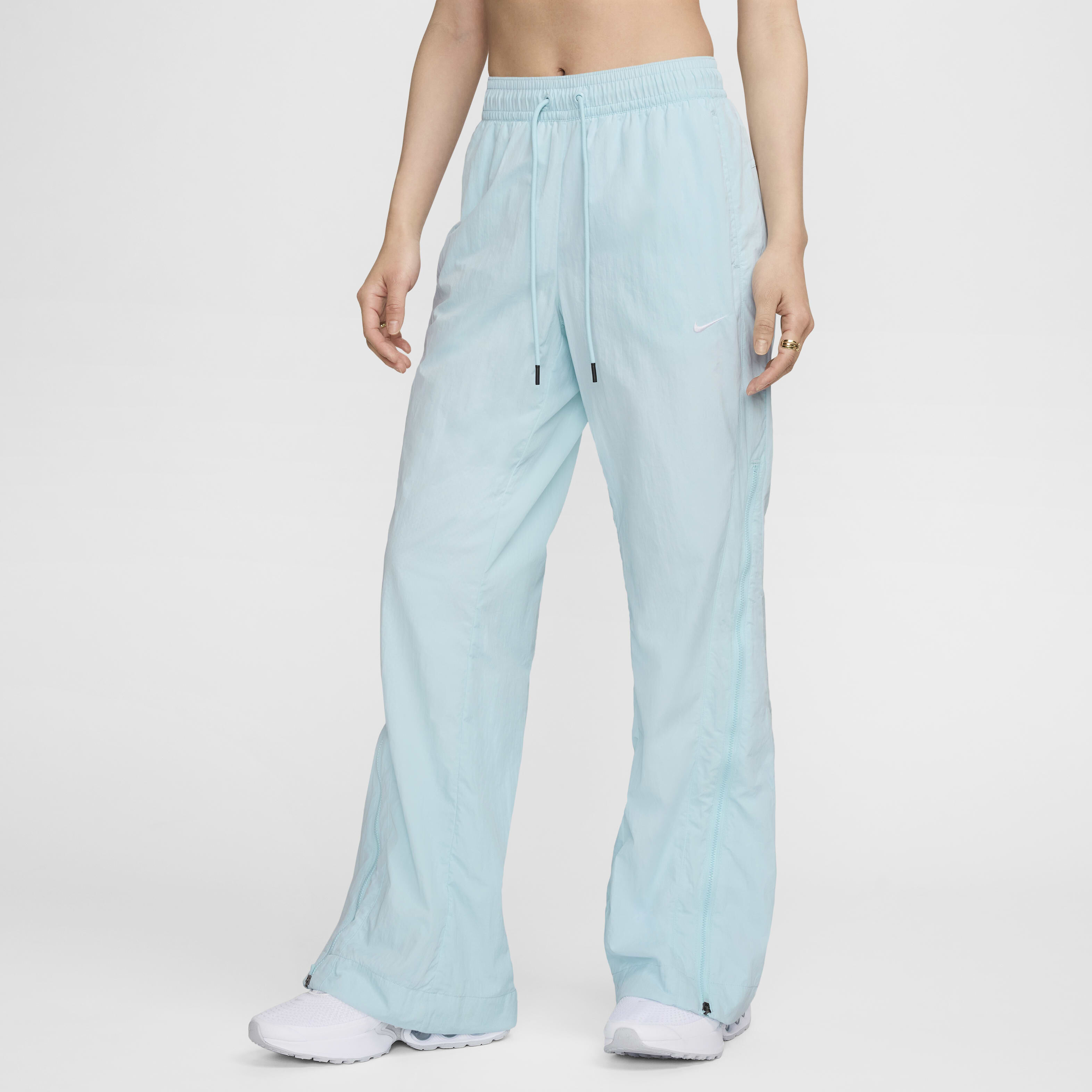 Buy Nike Sportswear Collection Women s Mid Rise Repel Zip Trousers Nike Qatar Official