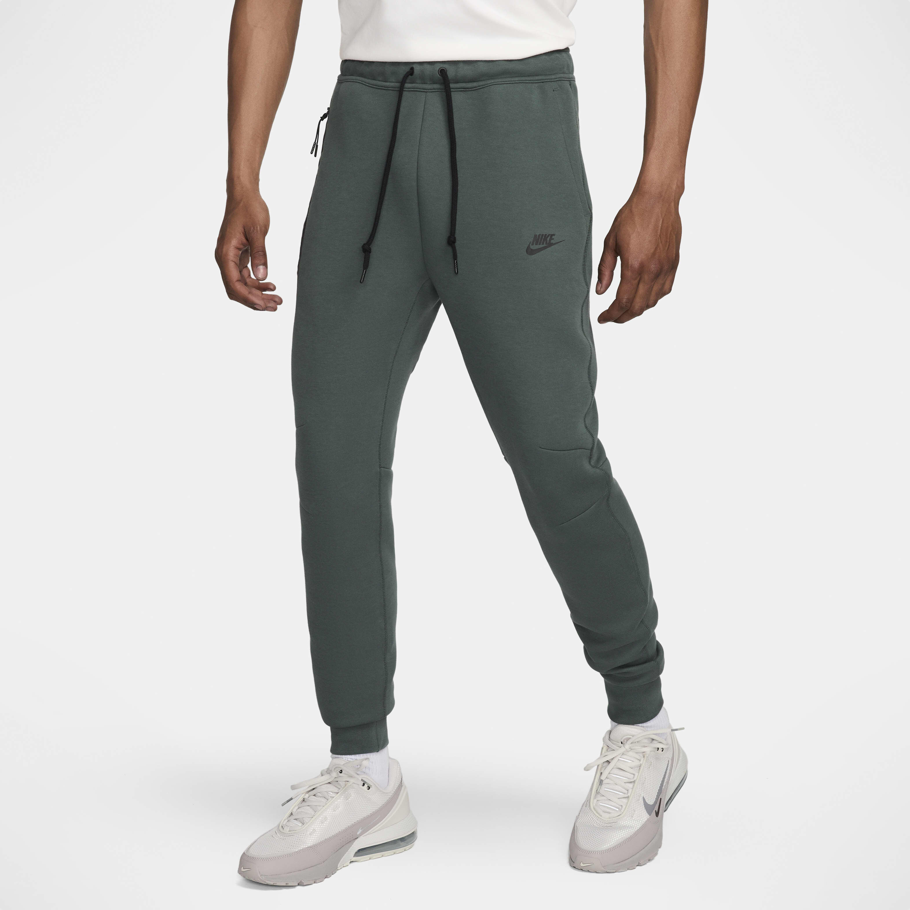 Nike skinny joggers in sage green shop