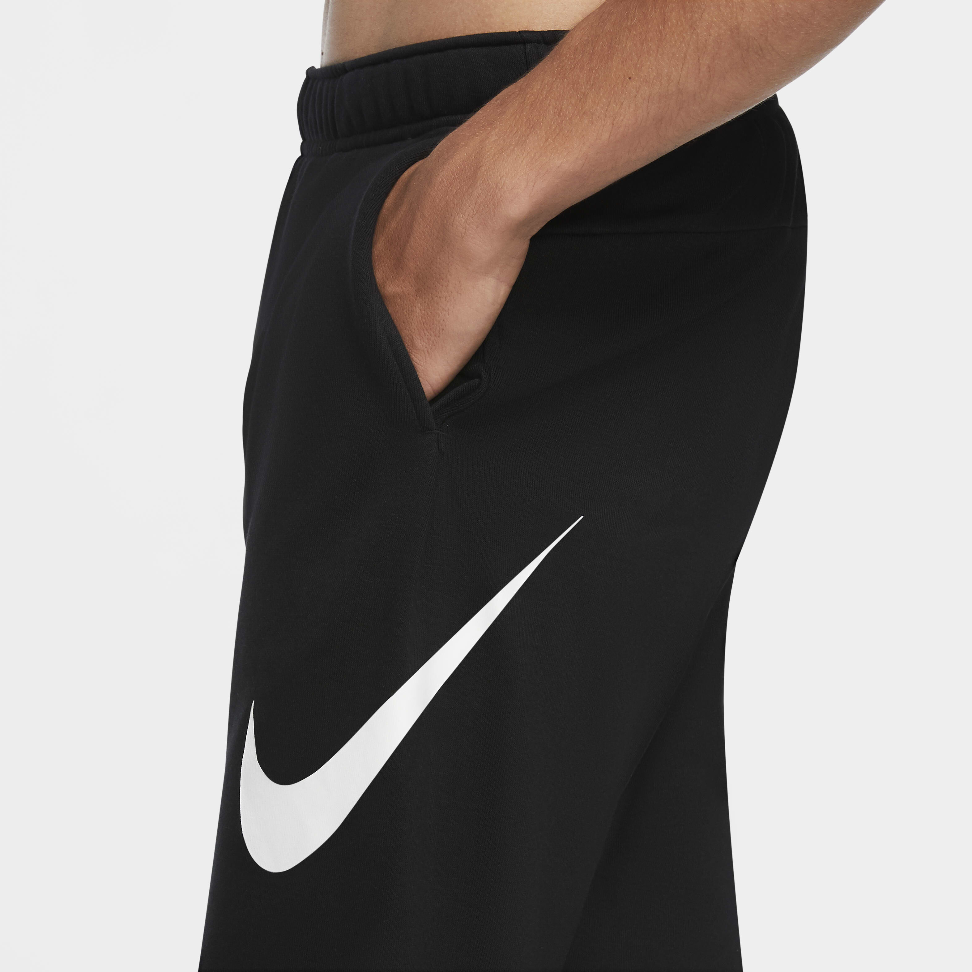 Buy Nike Dry Graphic Men s Dri FIT Taper Fitness Trousers Nike Qatar Official