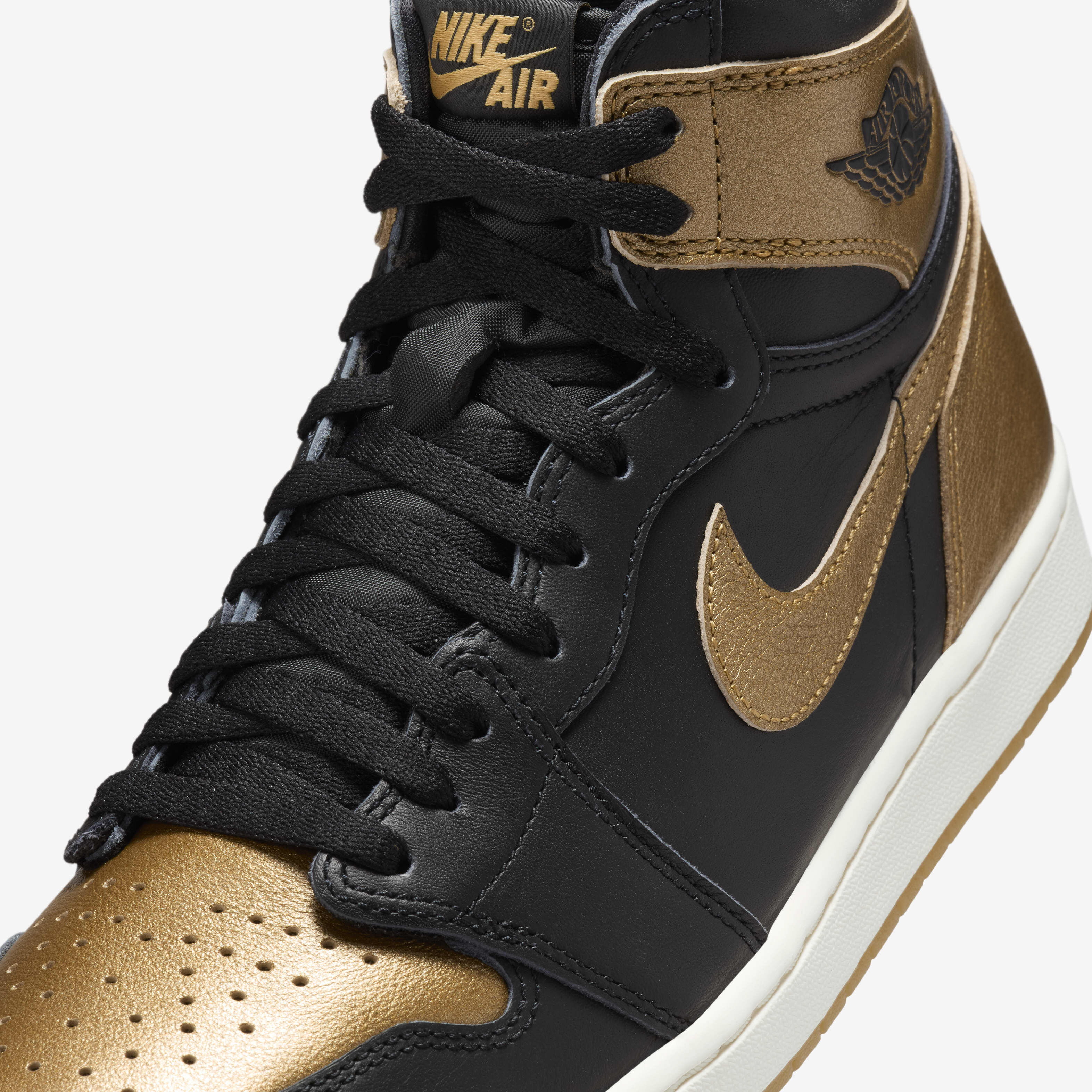 Nike black and gold mens shoes top