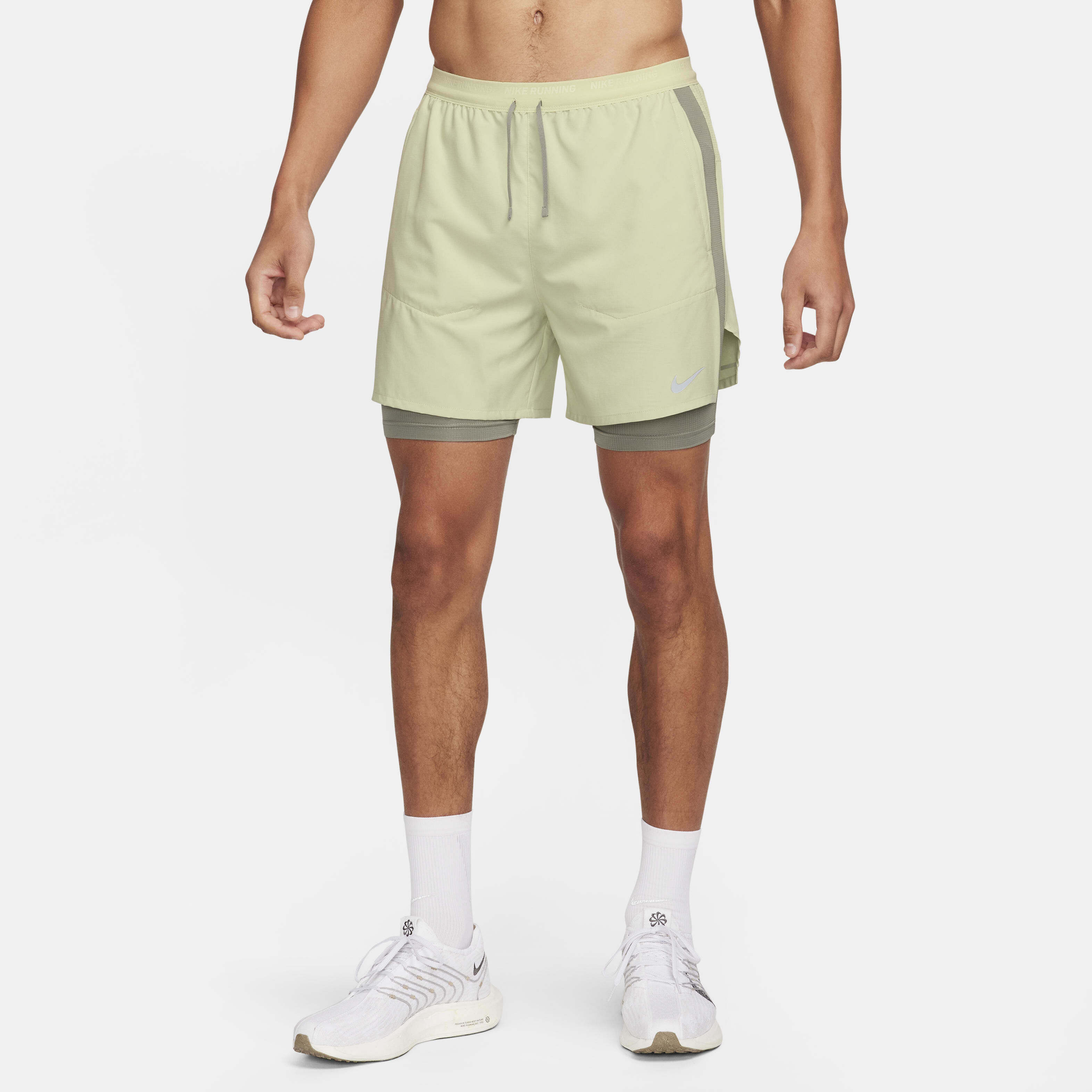 Buy Nike Stride Men s Dri FIT 13cm approx. Hybrid Running Shorts Nike Qatar Official