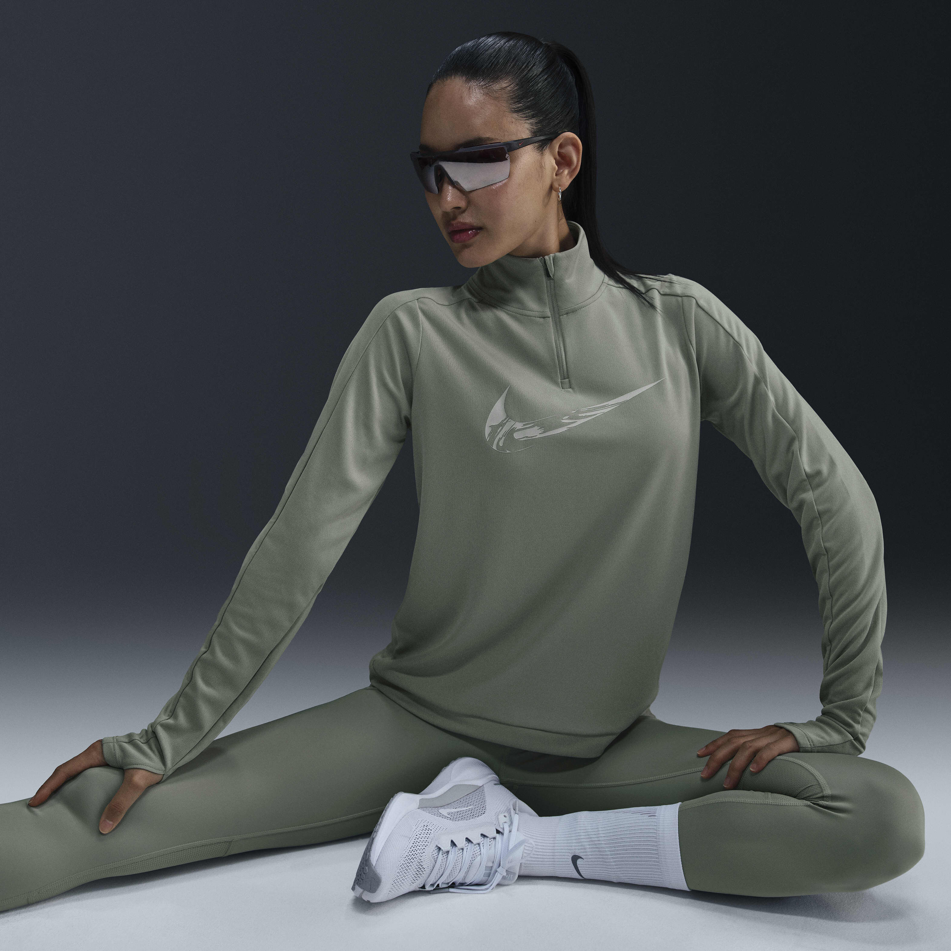 Buy Nike Swoosh Women s Dri FIT 1 4 Zip Running Mid Layer Nike Qatar Official